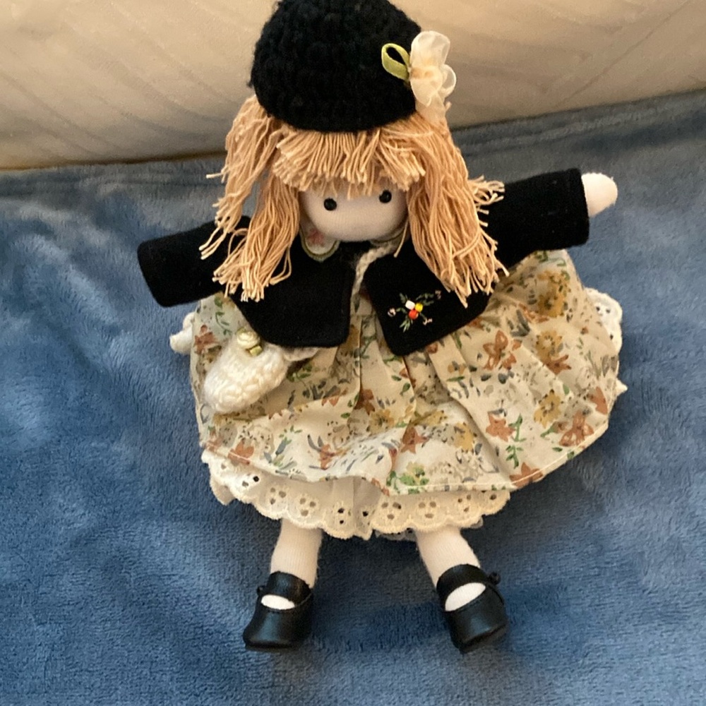 ,Price Reduced- adorable doll with music box under her petticoat.